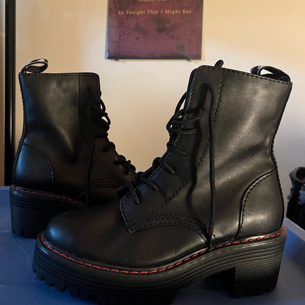 Unworn black combat boots